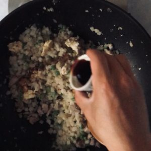 Pour sauces onto rice