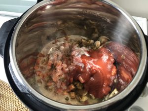 Simmering the spices together