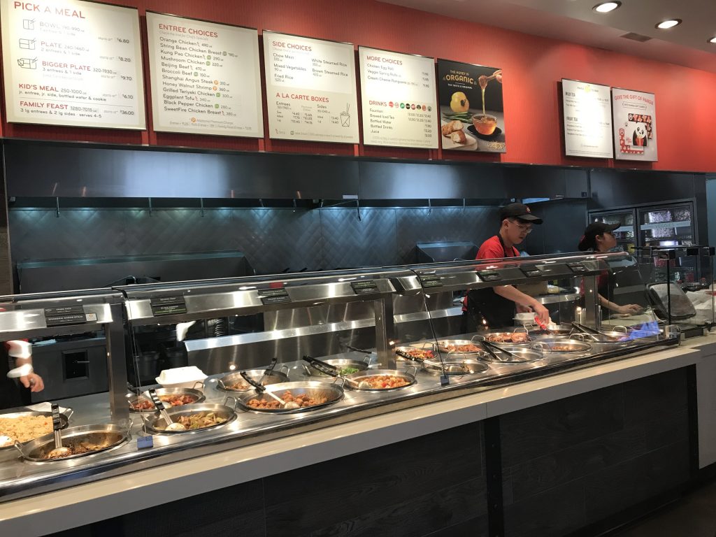 Panda Express employees making a bowl inside the restaurant