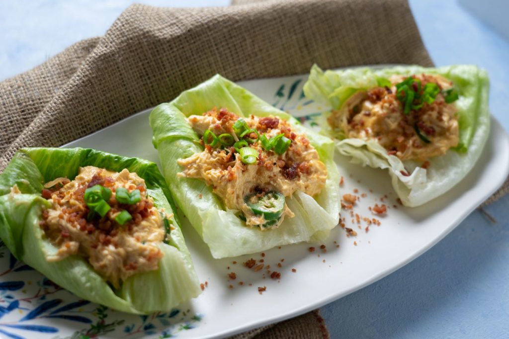 Three Crack Chicken Lettuce Wraps laid out on a plate